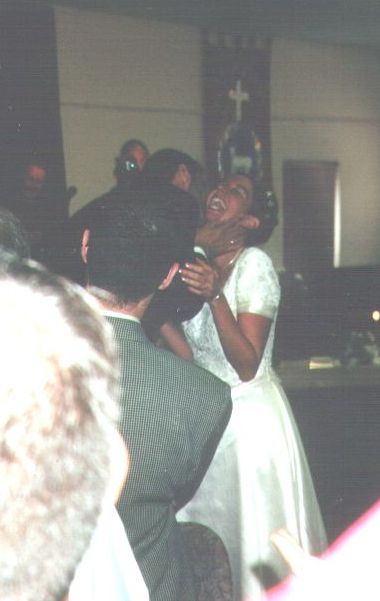 Larry kisses his wife (click for larger version)